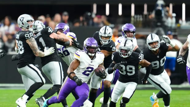 Dec 10, 2023; Paradise, Nevada, USA; Minnesota Vikings running back Alexander Mattison (2) gains yardage against the Las Vegas Raiders during the second quarter at Allegiant Stadium.